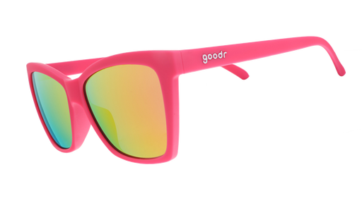 Three-quarter angle view of hot pink angled cat-eye sunglasses with pink reflective lenses.