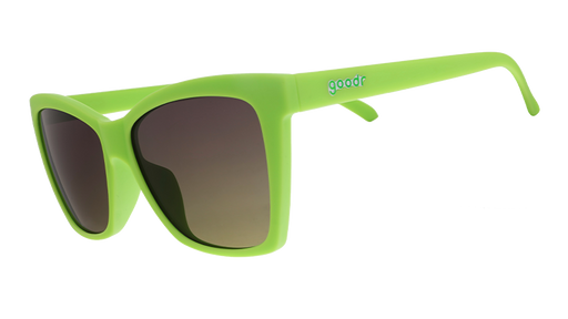 Three-quarter angle view of lime green angled cat-eye sunglasses with non-reflective black gradient lenses.