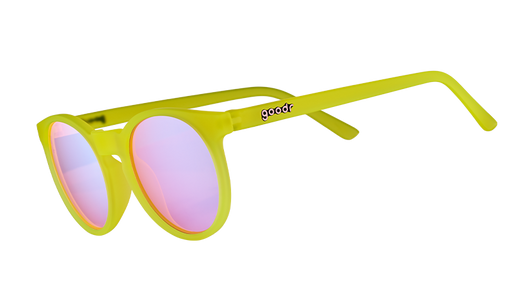 Three-quarter angle view of yellow round sunglasses with rose-tinted circle lenses.