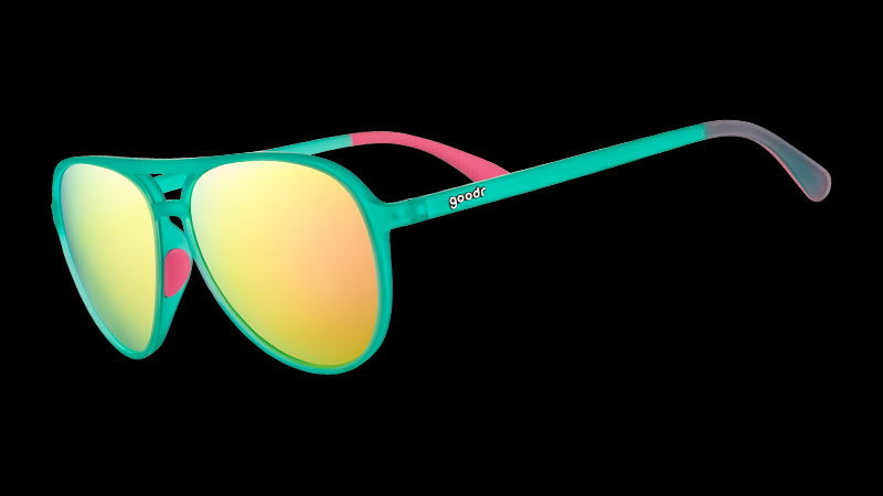 Three-quarter angle view of teal aviator sunglasses with hot pink inner silicone grips and polarized pink reflective lenses.