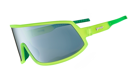 Three-quarter angle view of wraparound sunglasses with a gray reflective lens & neon yellow frame & green inner grips. 