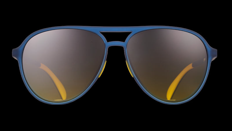 Front view of navy blue aviator sunglasses with dark amber lenses and yellow silicone grip accents inside the frames.