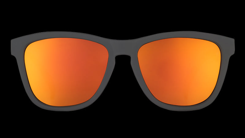 Front view of square-shaped black sunglasses with reflective amber lenses.