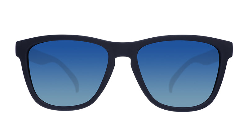Front view of square-shaped navy blue sunglasses with gradient blue lenses.