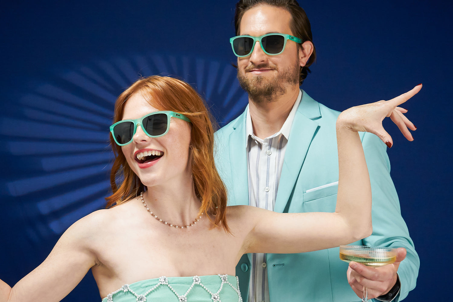 Man And Woman Wearing Mint Green Sunglasses