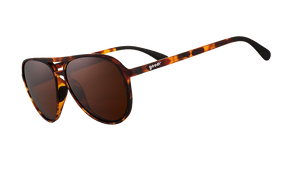 Three-quarter angle view of brown tortoiseshell aviator sunglasses with brown non-reflective lenses on a white background.