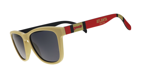 Three-quarter angle view of Major League Soccer Atlanta United shades. Gold+red frames. Black non-reflective lenses.