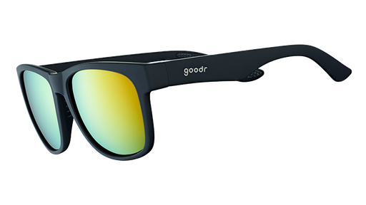 Three-quarter angle view of large square-shaped black sunglasses with mirrored amber lenses.