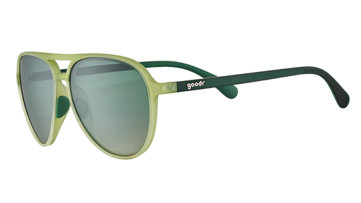 Three-quarter angle view of cadet green translucent aviator sunglasses with gradient green lenses and dark green arms.