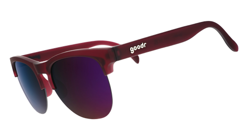 Three-quarter angle view of translucent purple half-rim sunglasses with purple reflective lenses.