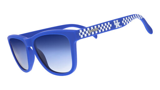 Three-quarter angle view of blue and white checkered sunglasses featuring blue gradient lenses and the University of Kentucky logo.