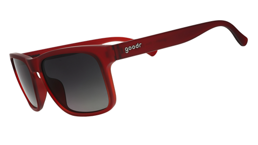 Three-quarter angle view of dark red Grand G frames and black gradient lenses.