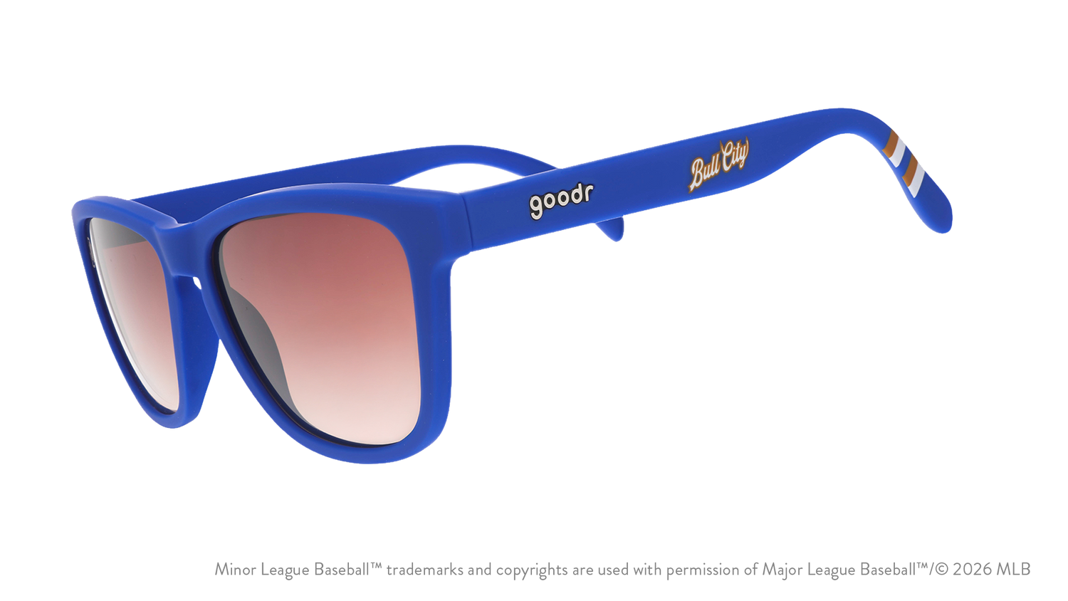 Three-quarter angle view of shades. Blue frames w/ stripe pattern+Bull City on temples. Brown gradient lenses.