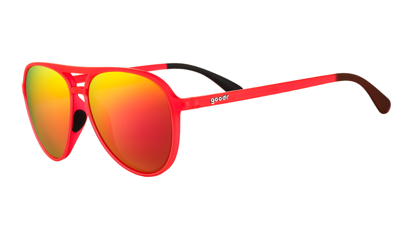 Three-quarter angle view of red aviator sunglasses with bright red mirrored lenses and black silicone inner nose & ear grips.