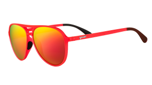 Three-quarter angle view of red aviator sunglasses with bright red mirrored lenses and black silicone inner nose & ear grips.