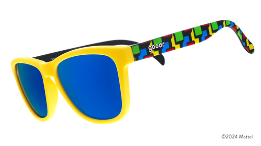 Three-quarter view of shades with a yellow faceplate, geometric design on arms using UNO's classic colors, & UNO lens etch.