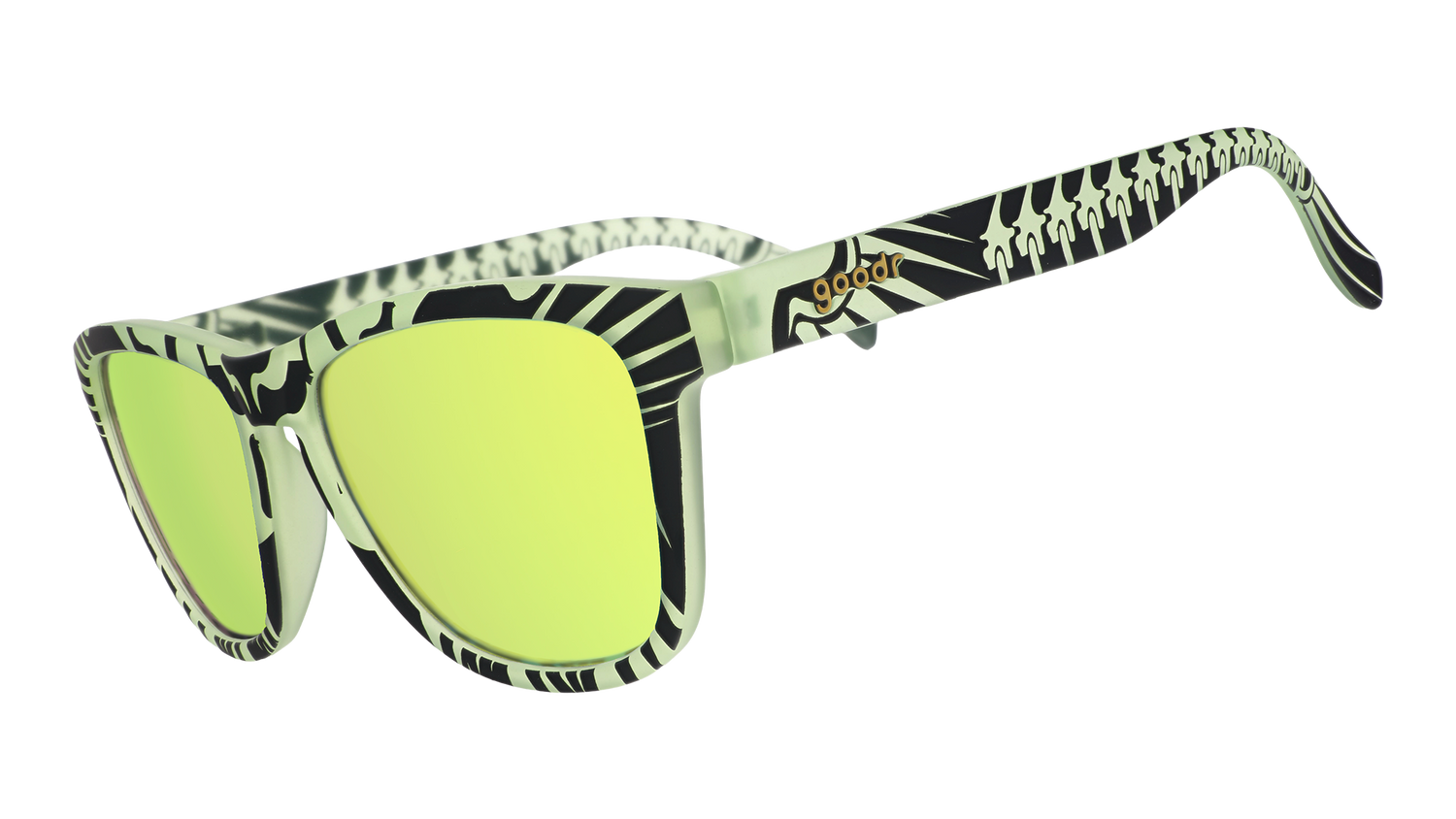 Three-quarter angle view of black frames with a green glow-in-the-dark skeletal design and green reflective lenses.