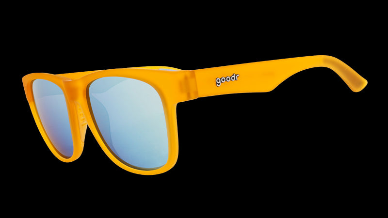 Three-quarter angle view of wide-fit orange sunglasses with square light blue reflective lenses.