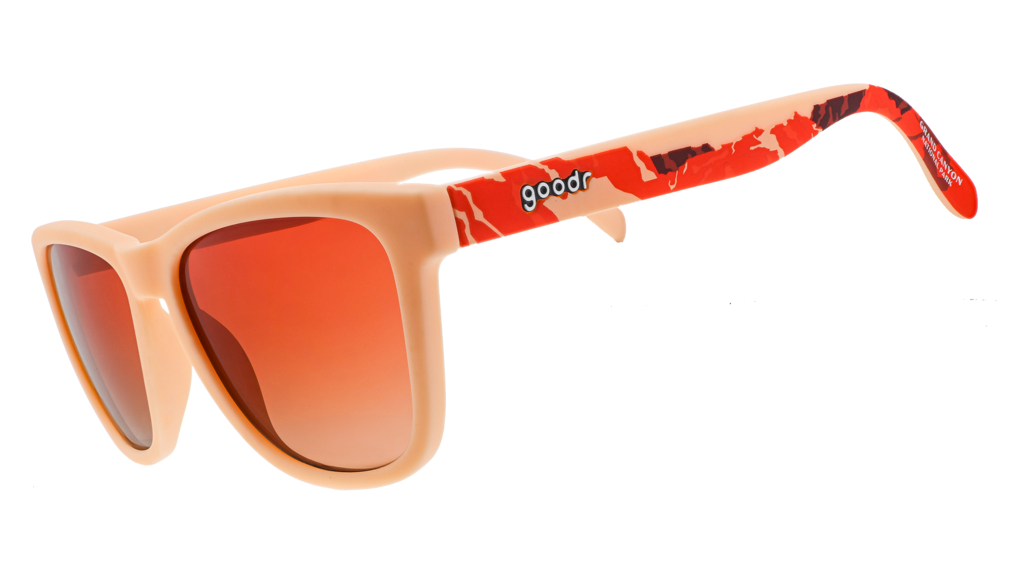 Grand Canyon National Park sunglasses, featuring square frames, orange lenses, and a mountain silhouette design across the temples in shades of orange, brown, and peach.