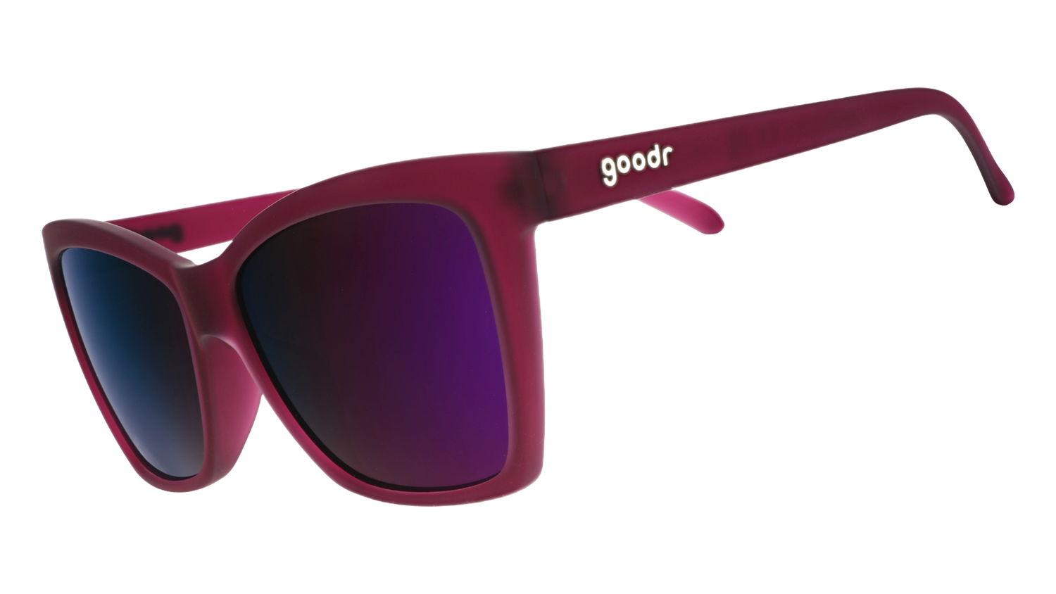 Three-quarter angle view of a pair of translucent red violet angular cat-eye sunglasses with reflective purple lenses.