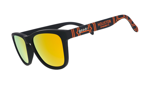 Three-quarter angle view of MLS Houston Dynamo FC shades tilted down. Black+orange frames. Amber reflective lenses.