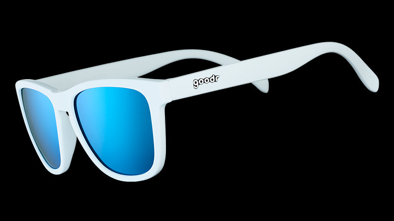 Three-quarter angle view of square-framed white sunglasses with blue reflective polarized lenses.