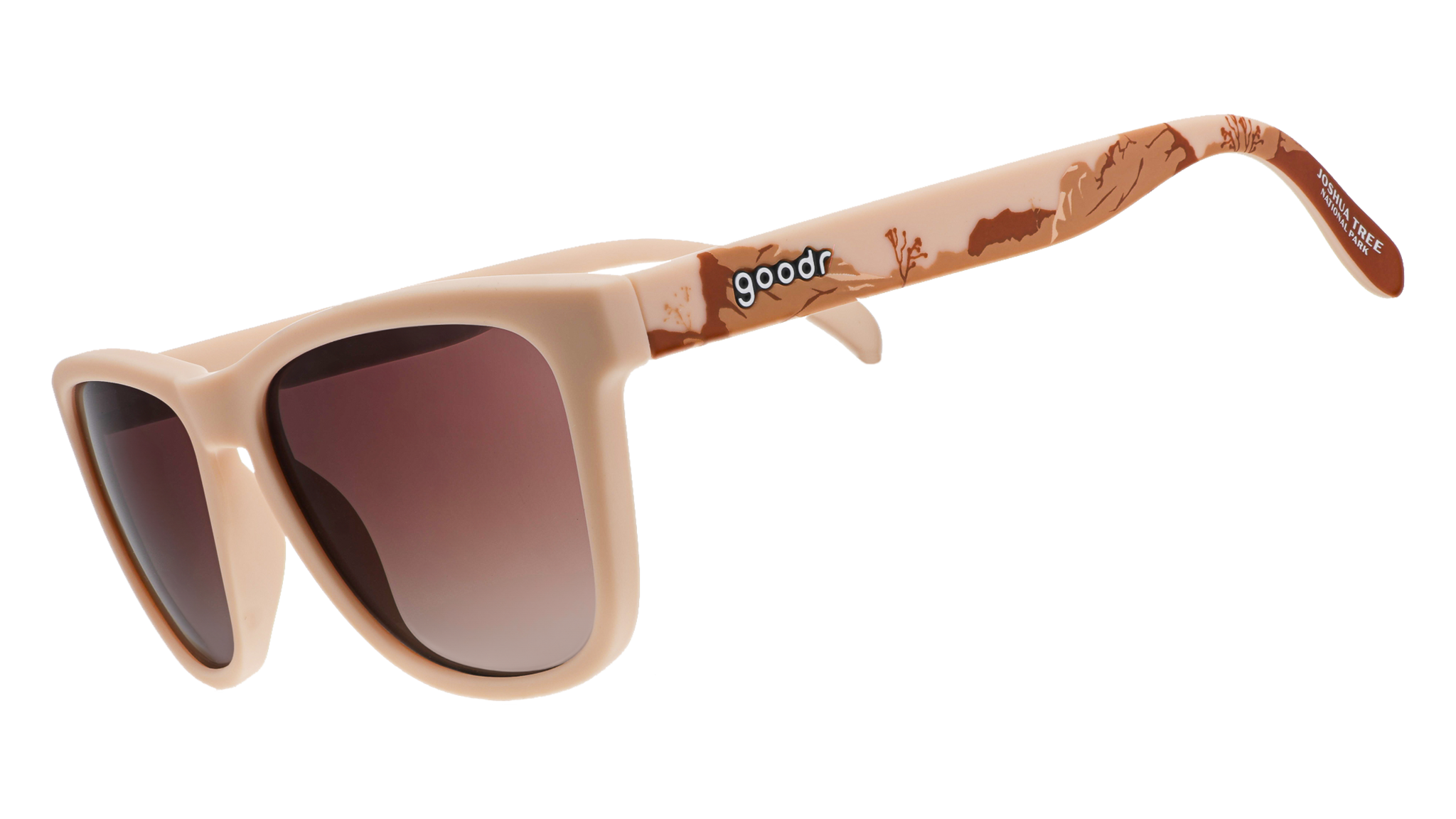 Joshua Tree National Park-themed sunglasses with brown-tinted lenses and a desert landscape design on beige frames, on a white background.