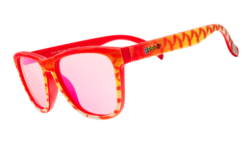 Three-quarter angle view of red and yellow limited-edition fuzzy sunglasses inspired by the scarlet macaw.