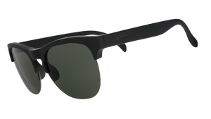 Three-quarter angle view of matte black half-rim sunglasses with dark green non-reflective lenses.
