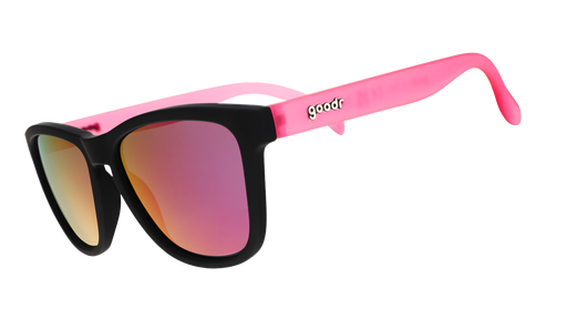 Three-quarter angle view of black and pink sunglasses with reflective pink lenses and goodr logo.