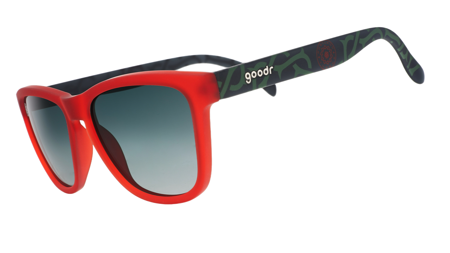 Three-quarter angle view of red and black frames with a green thorn pattern, green gradient lenses, and the Portland Thorns logo.