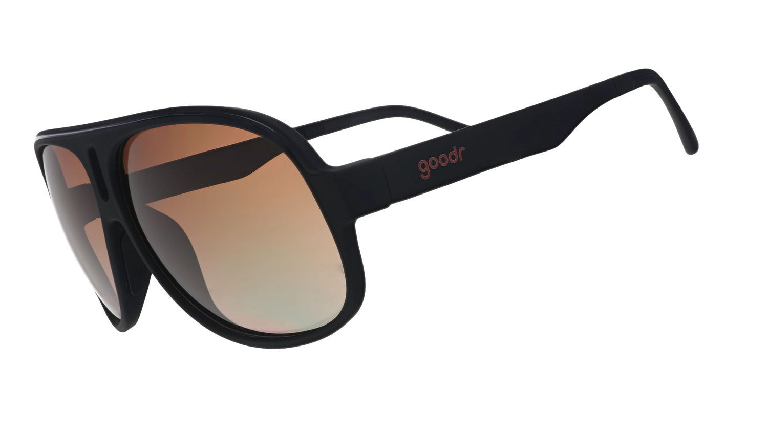 Three-quarter angle view of black aviator sunglasses with amber gradient lenses against a white background.