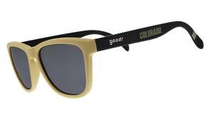 Three-quarter angle view of light brown and brown sunglasses with a Colorado print and black lenses.