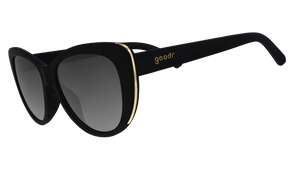 Black cat eye sunglasses with gold accents on the frame.