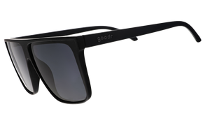 Three-quarter view of black wide-fit, oversized flat-top sunglasses with black non-reflective lenses.