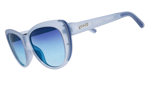 Three-quarter angle view of dusty blue translucent Glam Gs with blue gradient lenses.