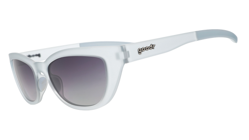 Three-quarter angle view of light blue cat-eye sunglasses with gradient violet lenses against a white background.
