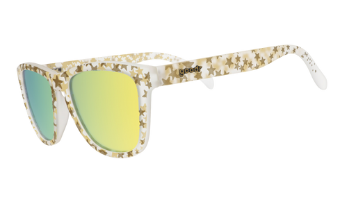 Three-quarter angle view of clear OG frames with a gold star pattern and gold reflective lenses.