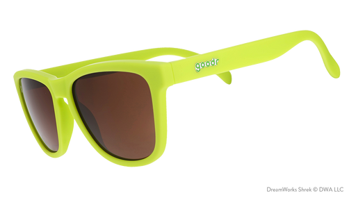 Bright green sunglasses with brown lenses on a white background