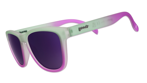 Three-quarter angle view of a pair of light green-to-purple ombre OG frames with purple reflective lenses.