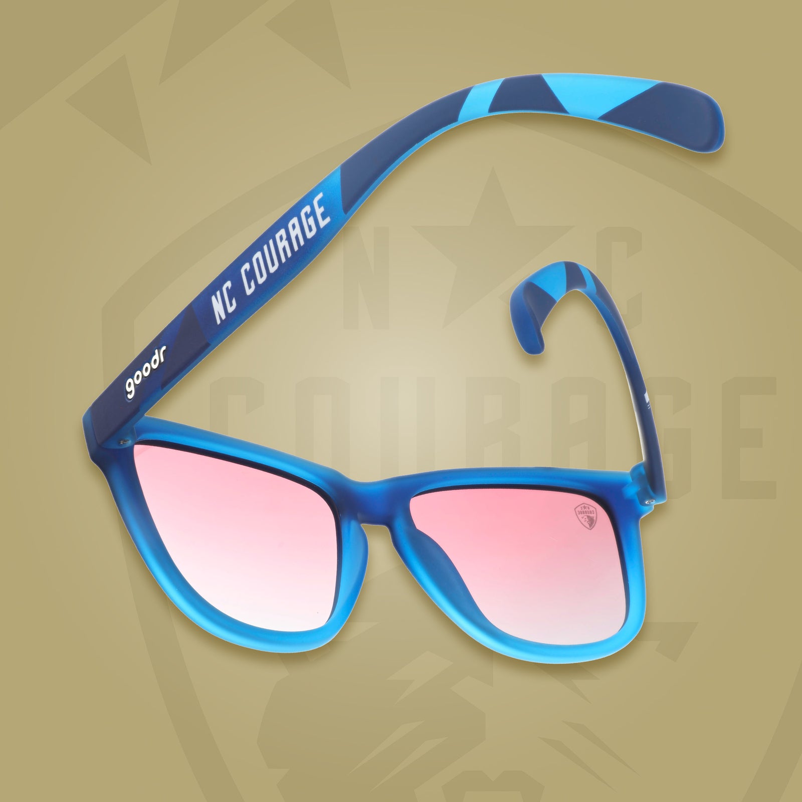 Back view of Atlantic blue frames with rose gradient lenses and NC Courage and goodr logo on a gold background.