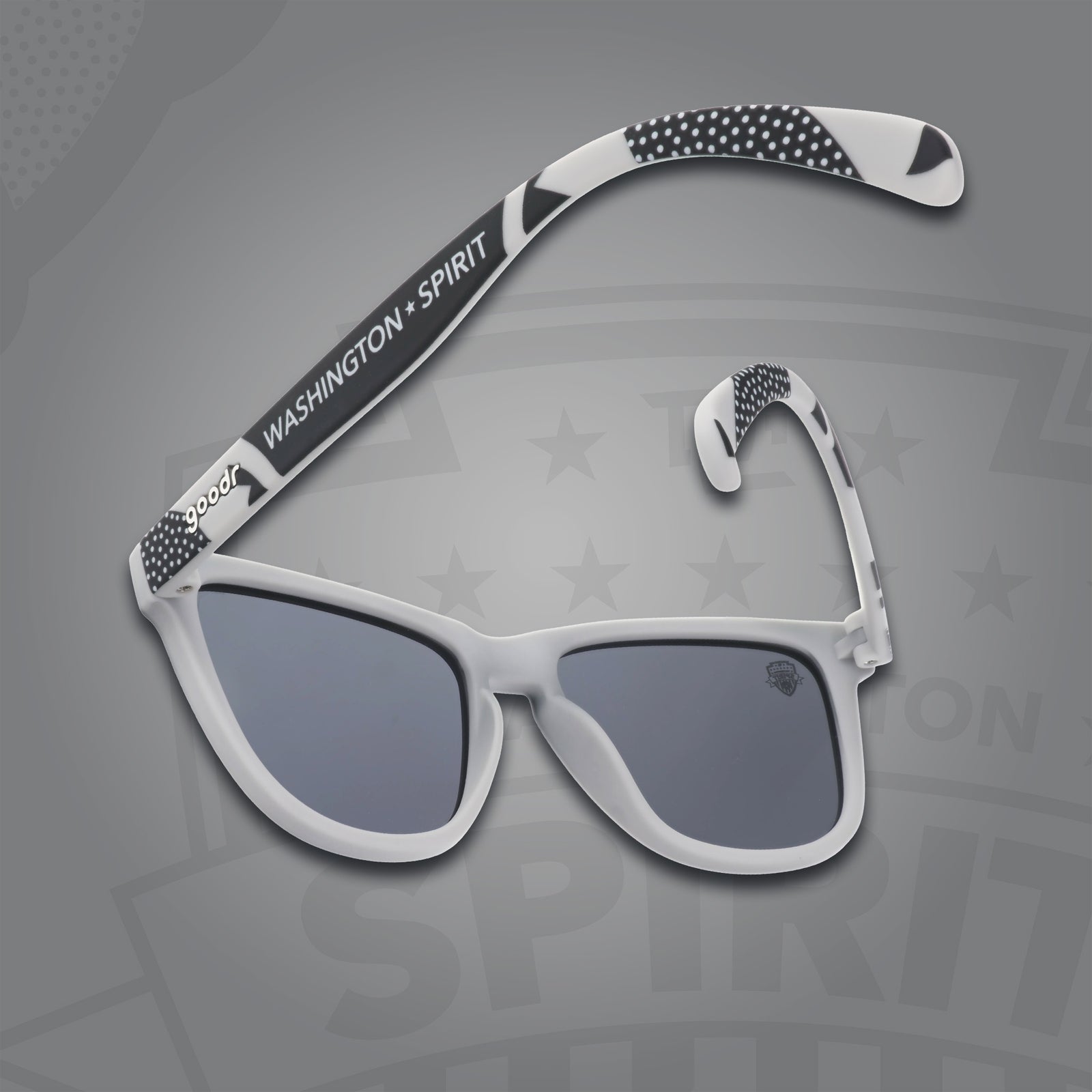 Back view of black and gray gradient sunglasses featuring black polarized lenses and the Washington Spirit logo on a gray background.