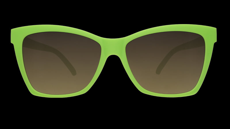 Front view of lime green angled cat-eye sunglasses with black gradient lenses.