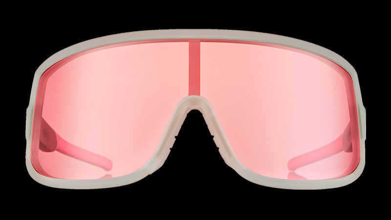 Front view of clear framed wraparound sunglasses with a rose-tinted single lens.