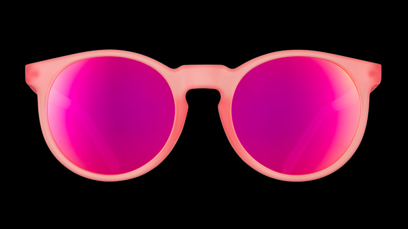 Front view of round pink sunglasses with polarized pink reflective lenses.
