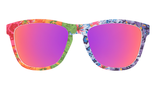 Front view of colorful floral print goodr sunglasses with purple reflective sunglasses.