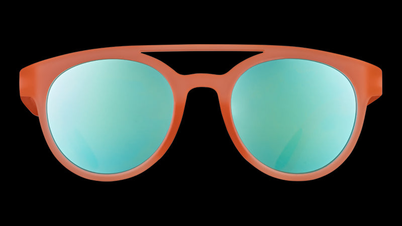 Front view of round orange sunglasses with a double bridge and teal reflective mirrored lenses.