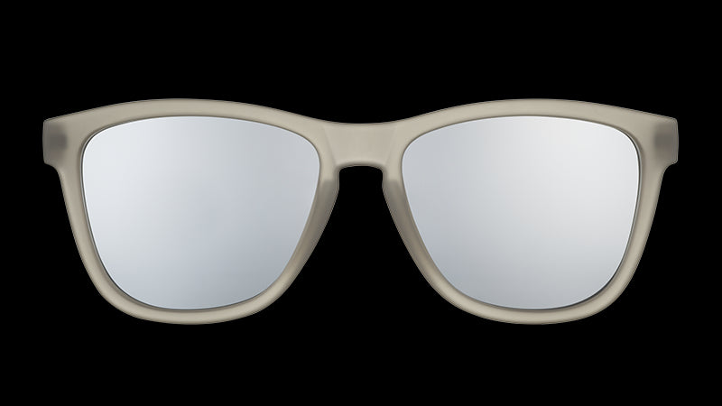 Front view of square-shaped sunglasses with translucent dark gray frames and gray polarized lenses.