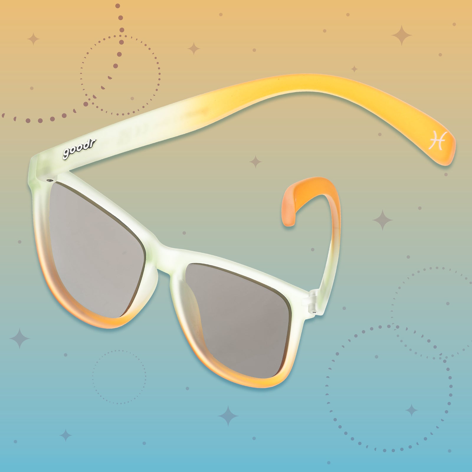 Back view of light teal-to-yellow sunglasses with light blue reflective lenses on a yellow-to-blue starry background.