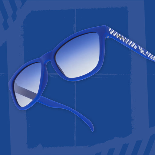 Three-quarter angle view of blue & white checkered sunglasses featuring blue gradient lenses & the University of Kentucky logo on a blue background.